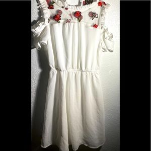 White dress with flower design